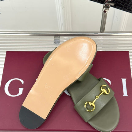 SLIDE SANDALS IN MOSS GREEN CALFSKIN WITH GOLD HARDWARE
