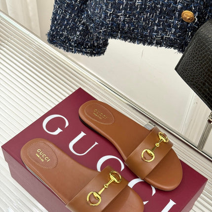 SLIDE SANDALS IN BROWN CALFSKIN WITH GOLD HARDWARE