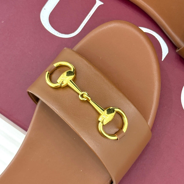 SLIDE SANDALS IN BROWN CALFSKIN WITH GOLD HARDWARE