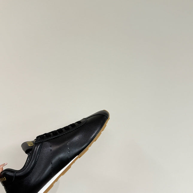 PLUME NAPPA SNEAKERS IN BLACK LAMBSKIN