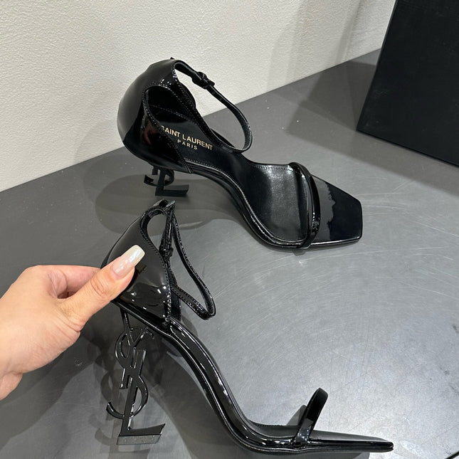 YSL HEELED SANDALS 25S 105 MM IN BLACK GLOSSY LAMBSKIN