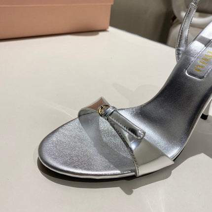 TWO STRAP HIGH HEELED SANDALS IN SILVER METALLIC GLOSSY SHEEPSKIN