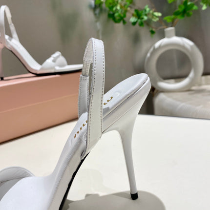 TWO STRAP HIGH HEELED SANDALS IN WHITE GLOSSY SHEEPSKIN