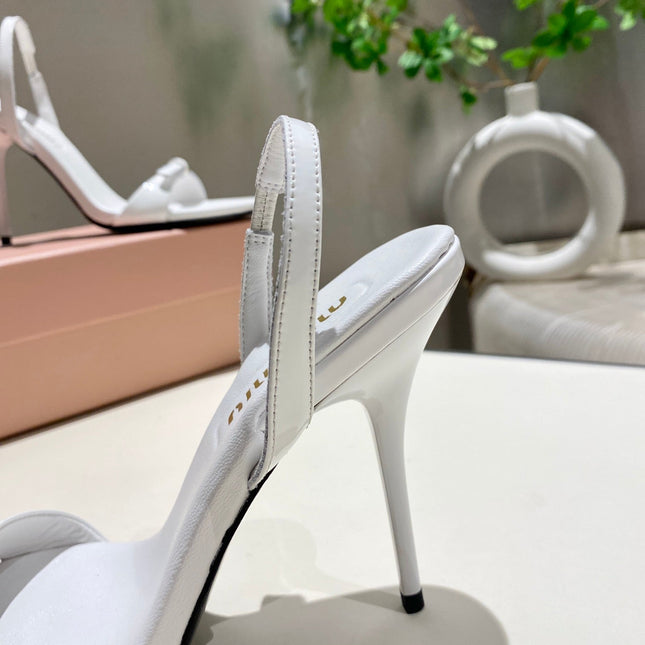 TWO STRAP HIGH HEELED SANDALS IN WHITE GLOSSY SHEEPSKIN