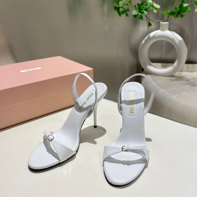 TWO STRAP HIGH HEELED SANDALS IN WHITE GLOSSY SHEEPSKIN