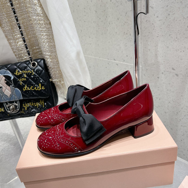 MARY JANE MID HEEL PUMPS IN RUBY RED PATENT LAMBSKIN WITH BOW