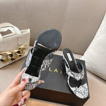 ALAIA HEELED THONG SANDALS 25S 55MM IN WHITE AND BLACK LAMBSKIN SNAKE-EMBOSSED
