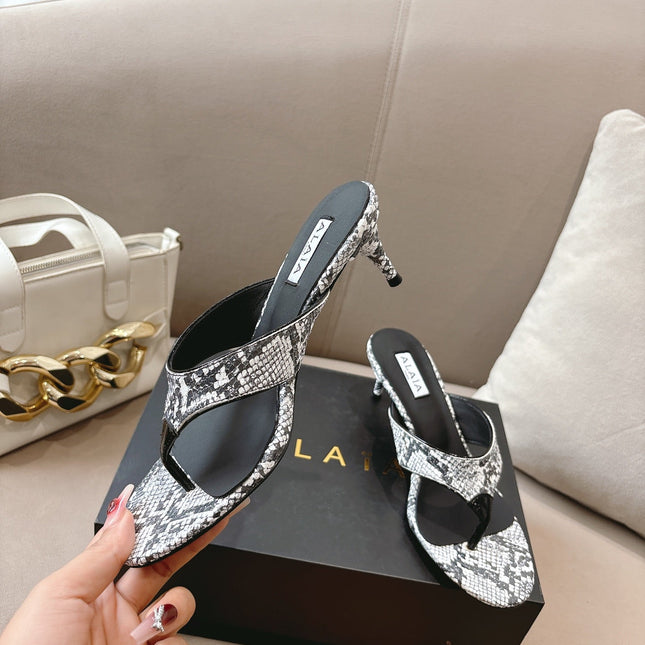 ALAIA HEELED THONG SANDALS 25S 55MM IN WHITE AND BLACK LAMBSKIN SNAKE-EMBOSSED