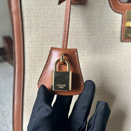 CABAS 37 IN WHITE CANVAS AND BRONZE BROWN CALFSKIN TRIM GOLD LOCK