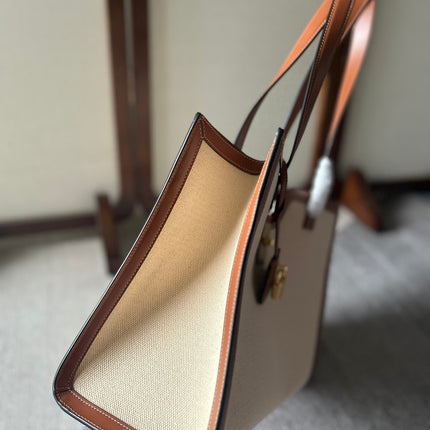 CABAS 37 IN WHITE CANVAS AND BRONZE BROWN CALFSKIN TRIM GOLD LOCK