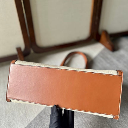 CABAS 37 IN WHITE CANVAS AND BRONZE BROWN CALFSKIN TRIM GOLD LOCK