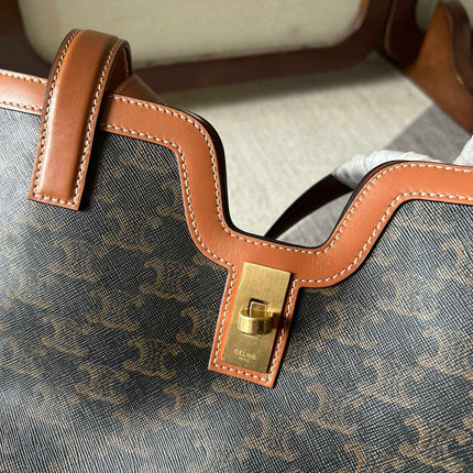 CABAS 37 IN BLACK TRIOMPHE CANVAS AND BRONZE BROWN CALFSKIN TRIM GOLD LOCK