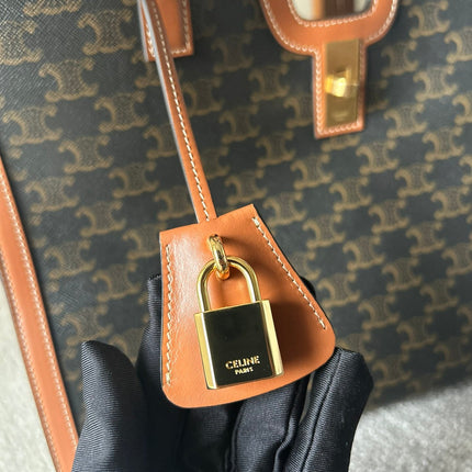 CABAS 37 IN BLACK TRIOMPHE CANVAS AND BRONZE BROWN CALFSKIN TRIM GOLD LOCK