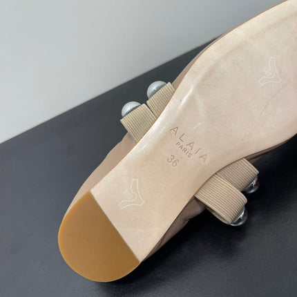 ALAIA BALLET FLATS IN ALMOND BEIGE GLOSSY CALFSKIN WITH SILVER HARDWARE