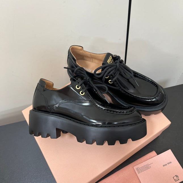 LACE-UP LOAFERS WITH THICK SOLE IN BLACK SHINY SHEEPSKIN