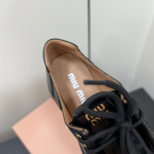 LACE-UP LOAFERS WITH THICK SOLE IN BLACK SHINY SHEEPSKIN