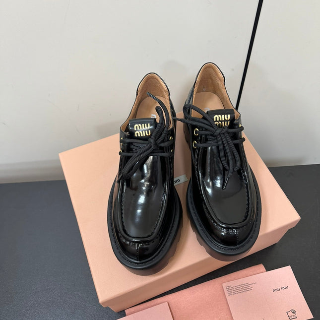 LACE-UP LOAFERS WITH THICK SOLE IN BLACK SHINY SHEEPSKIN