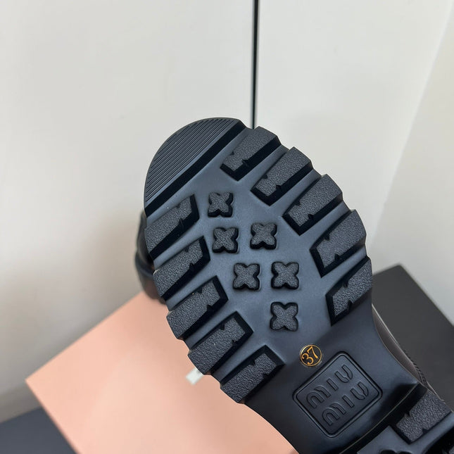 LACE-UP LOAFERS WITH THICK SOLE IN BLACK SHINY SHEEPSKIN