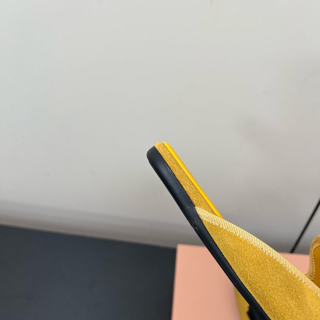 BOW MULES IN DUST YELLOW SUEDE