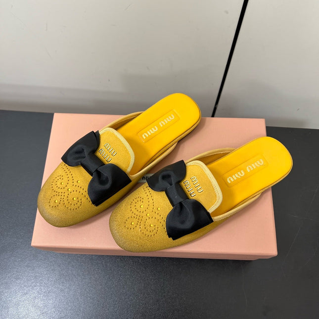 BOW MULES IN DUST YELLOW SUEDE