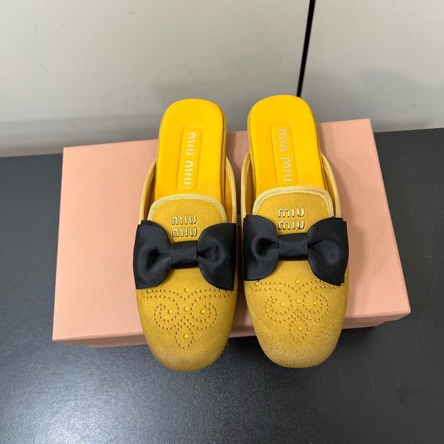 BOW MULES IN DUST YELLOW SUEDE