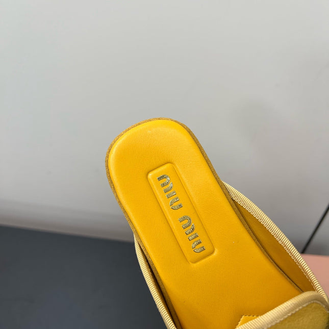 BOW MULES IN DUST YELLOW SUEDE