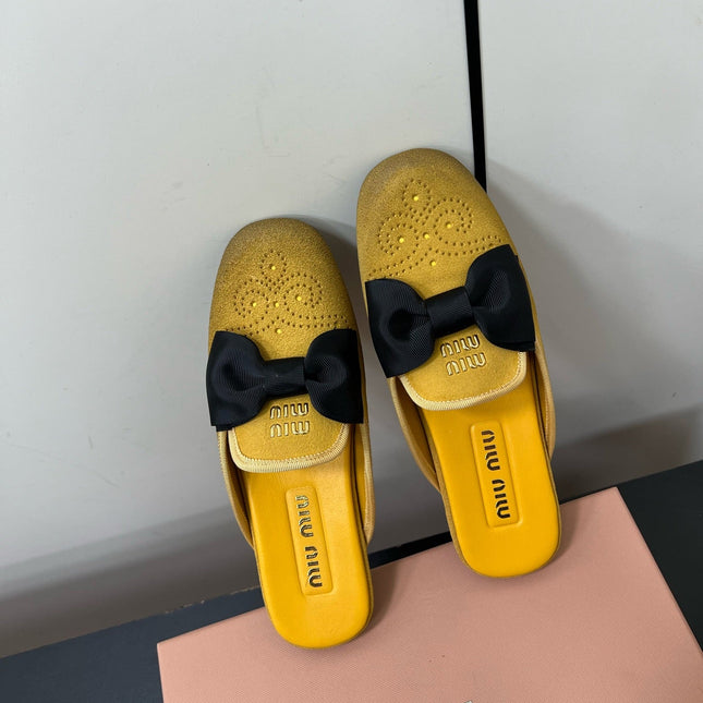 BOW MULES IN DUST YELLOW SUEDE