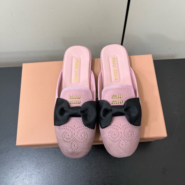 BOW MULES IN DUST PINK SUEDE