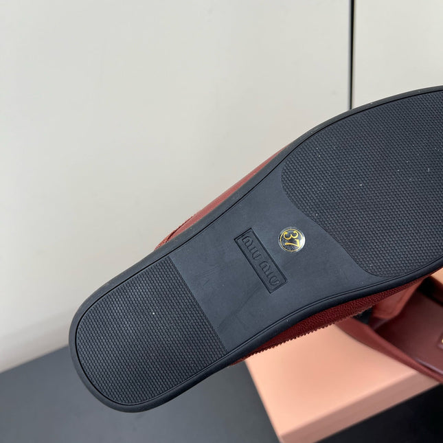 BOW MULES IN RED BROWN SHEEPSKIN