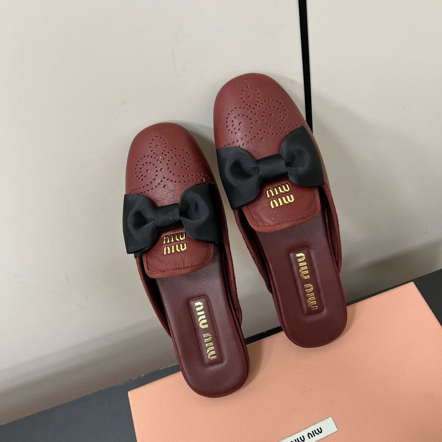 BOW MULES IN RED BROWN SHEEPSKIN