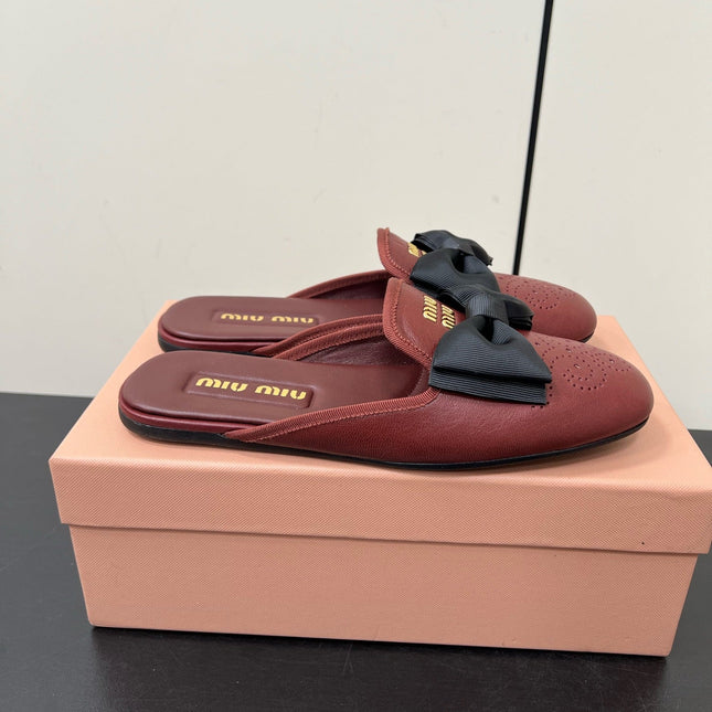 BOW MULES IN RED BROWN SHEEPSKIN