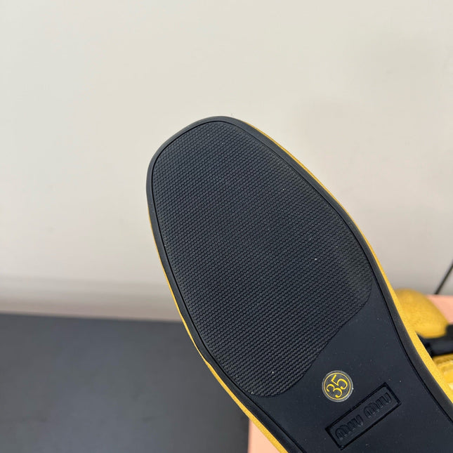 LOAFERS WITH BOW IN DUST YELLOW SUEDE