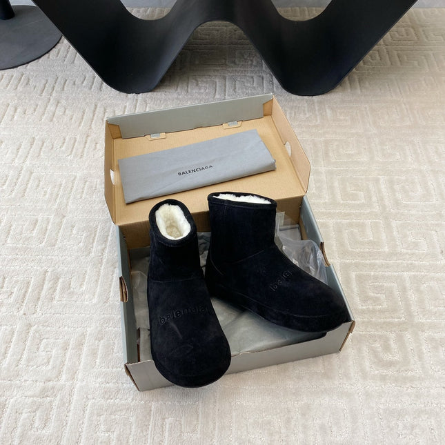 FLAT ANKLE BOOTS IN BLACK SUEDE AND SHEARLING LINING