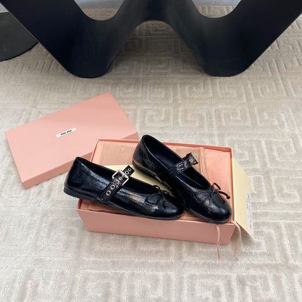 BOW MARY JANE FLAT IN BLACK NAPLAK LAMBSKIN