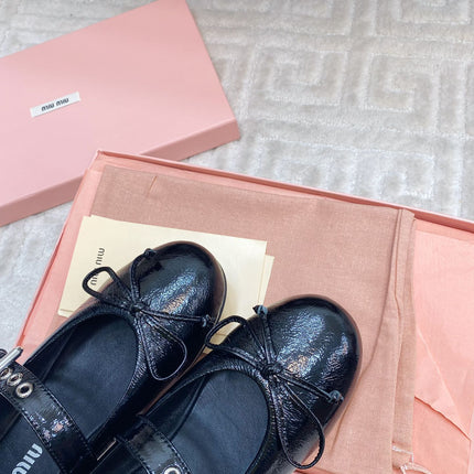 BOW MARY JANE FLAT IN BLACK NAPLAK LAMBSKIN