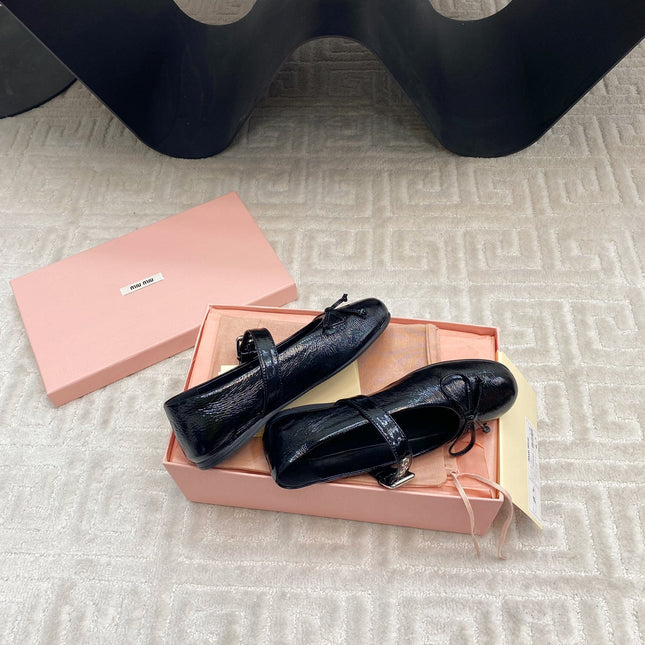 BOW MARY JANE FLAT IN BLACK NAPLAK LAMBSKIN