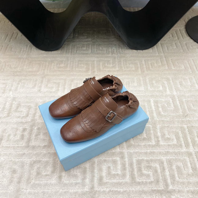 TASSEL LOAFERS IN RUSSET BROWN LAMBSKIN