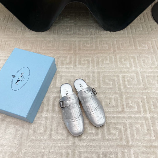 TASSEL MULES IN SILVER METALLIC LAMBSKIN