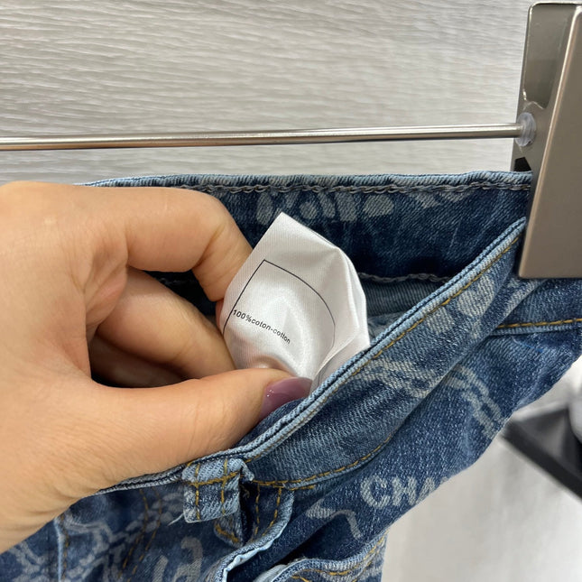 CHANEL FLARED JEANS WITH LOGO PRINT 263984