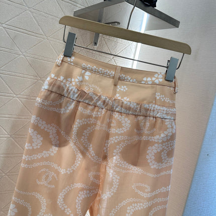 CHANEL BEIGE PRINTED DENIM PANTS