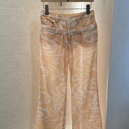 CHANEL BEIGE PRINTED DENIM PANTS