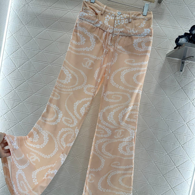 CHANEL BEIGE PRINTED DENIM PANTS