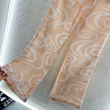 CHANEL BEIGE PRINTED DENIM PANTS
