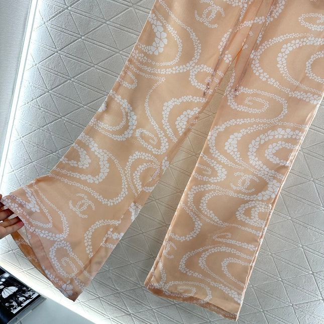 CHANEL BEIGE PRINTED DENIM PANTS