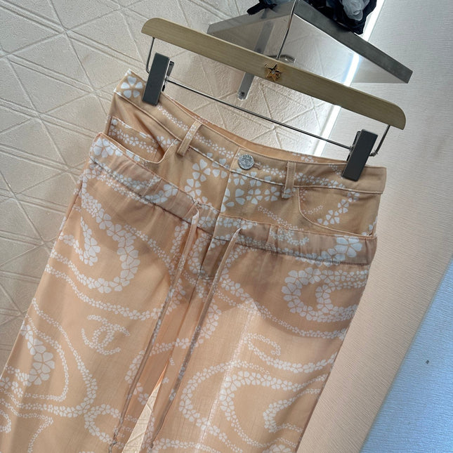 CHANEL BEIGE PRINTED DENIM PANTS