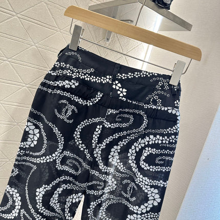 CHANEL BLACK PRINTED DENIM PANTS