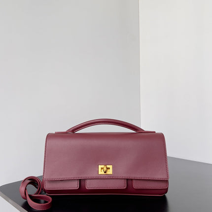 BEL AIR CLUTCH 27 IN BURGUNDY RED NAPPA LAMBSKIN GOLD HARDWARE