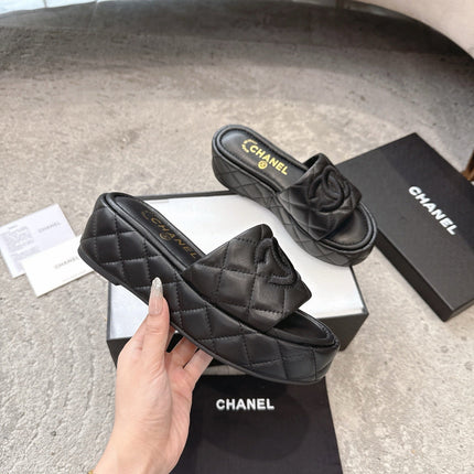 WEDGE HEELS IN BLACK CALFSKIN QUILTED