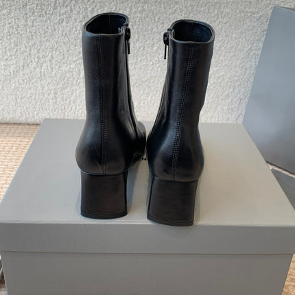 ANKLE BOOTS IN BLACK LOGO EMBOSSED SOFT SHEEPSKIN