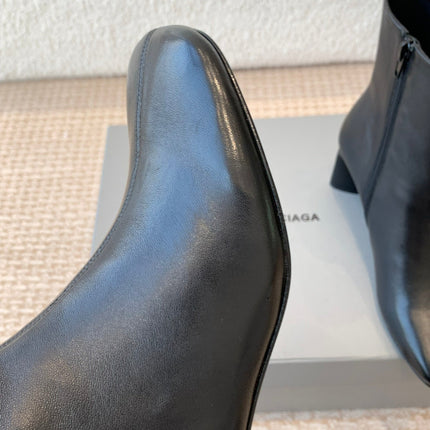 ANKLE BOOTS IN BLACK LOGO EMBOSSED SOFT SHEEPSKIN